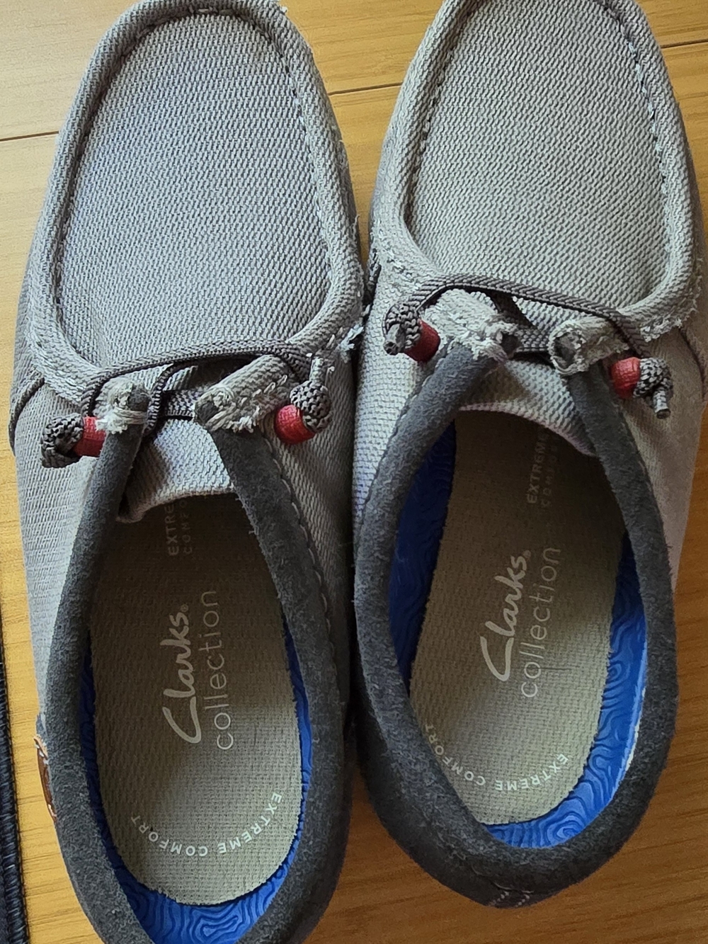 Clarks Men’s Light Gray Canvas Slip-On Loafers with Red Accents